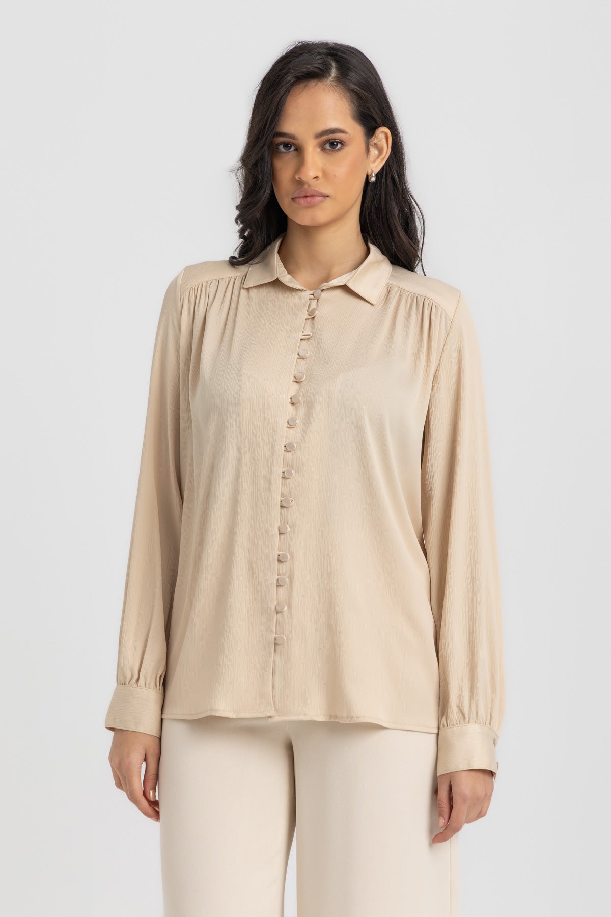 L. Beige